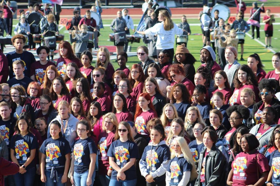 Combined band and and choir members rehearsing R.O.C.K in the U.S.A. the morning of Spirit the City.  