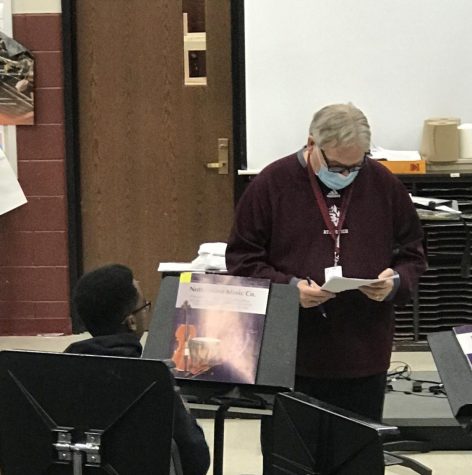 West Principal Mr. Rich Mertens serving as a substitute teacher for a band class in January